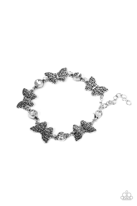 Has a WING to It - White Paparazzi Accessories
